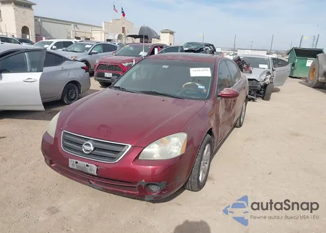 2002 Nissan Altima 2.5 Sl z USA, uszkodzony, nr VIN 1N4AL11E92C231370